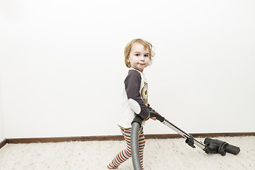 Image showing child doing household chore