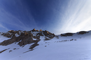 Image showing Sunrise in snowy mountains