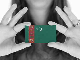 Image showing Woman showing a business card