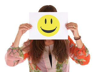 Image showing Young woman holding paper with happy smiley