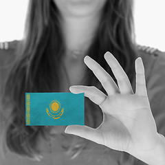 Image showing Woman showing a business card