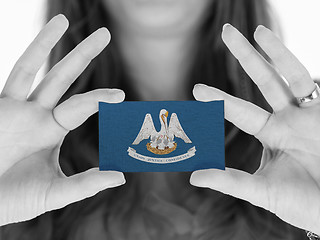 Image showing Woman showing a business card