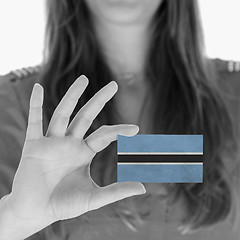 Image showing Woman showing a business card