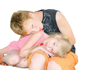 Image showing Two kids brother and sister curled up together
