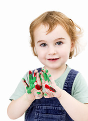 Image showing cute girl with finger paint