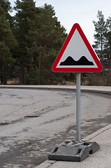 Image showing Sign and potholes on the road