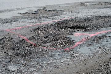 Image showing Big potholes on the road