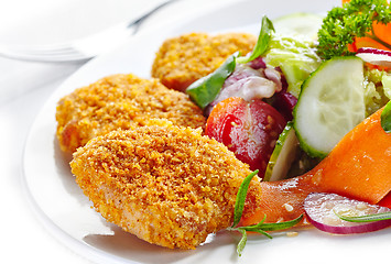 Image showing chicken nuggets and vegetable salad