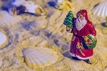 Image showing Santa Claus on a beach