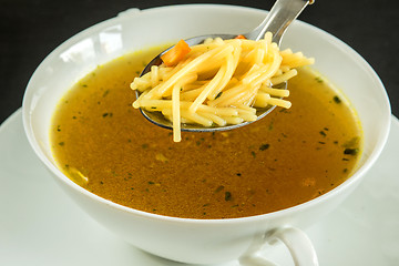 Image showing beef broth with noodles