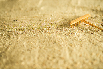 Image showing Rake at a beach