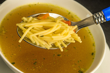 Image showing beef broth with noodles