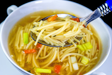 Image showing beef broth with noodles