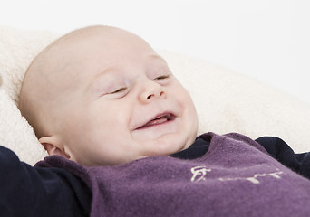 Image showing smiling young child in light background