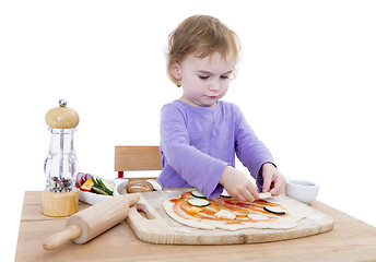 Image showing child making fresh pizza