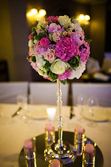 Image showing Celebratory tables decorated with flowers