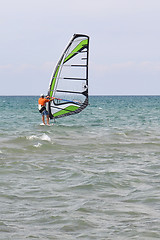 Image showing The man is engaged in windsurfing in the sea