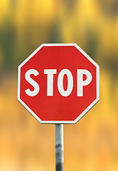 Image showing stop sign over autumn background