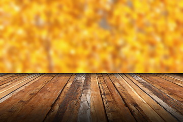 Image showing wooden terrace with view to the autumn forest