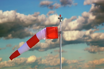 Image showing windsock over stormy sky