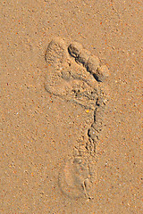 Image showing Trace of a bare foot of the person on sand