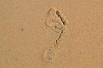 Image showing Trace of a bare foot of the person on sand