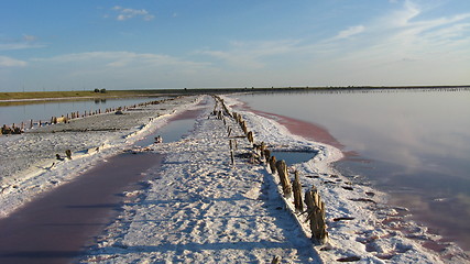Image showing landscape of extraction of salt with sun