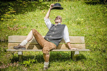 Image showing Bavarian man on bench
