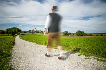 Image showing Traditional Bavarian man is running