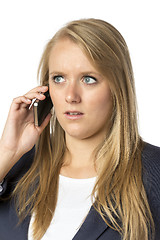 Image showing Blond phoning serious woman