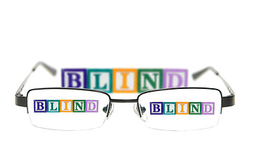 Image showing Letter blocks spelling blind through a pair of glasses