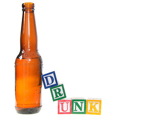 Image showing Letter blocks spelling drunk with a beer bottle