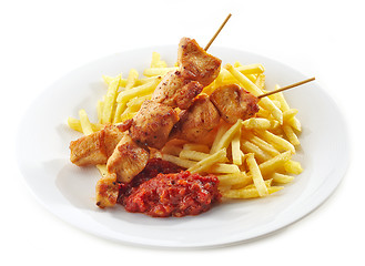 Image showing grilled chicken meat and french fries 