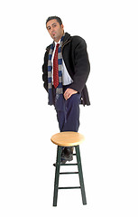 Image showing Man with chair.