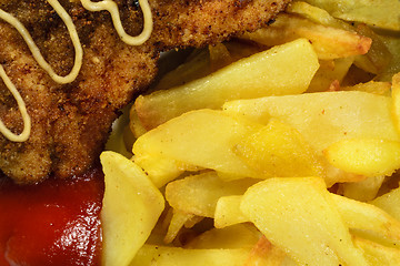 Image showing French fries with chicken chops