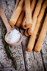 Image showing bread sticks grissini with rosemary and salt 