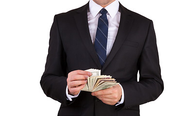 Image showing Businessman is counting money