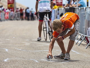 Image showing Boy Paiting the Road