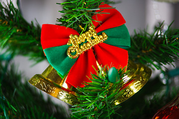 Image showing christmas bell hanging on the christmas tree