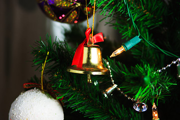 Image showing christmas bell hanging on the christmas tree