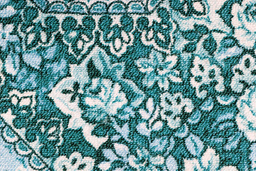 Image showing Fragment of colorful retro tapestry textile pattern with floral ornament useful as background