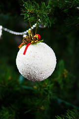 Image showing beautiful snow hanging on a Christmas tree