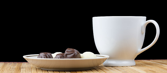 Image showing cup and saucer sweet candy