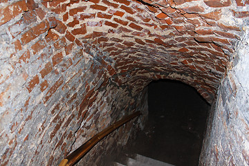 Image showing Well lit catacombs of the castle