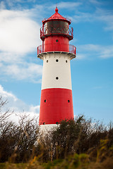 Image showing landscape baltic sea dunes lighthouse in red and white 