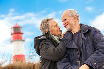 Image showing happy mature couple relaxing baltic sea dunes 
