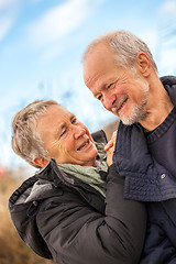 Image showing happy mature couple relaxing baltic sea dunes 