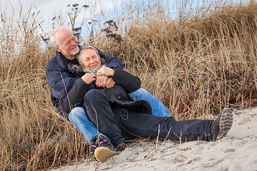 Image showing happy mature couple relaxing baltic sea dunes 