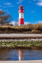 Image showing landscape baltic sea dunes lighthouse in red and white 