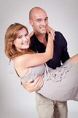 Image showing young attractive couple in love embracing portrait